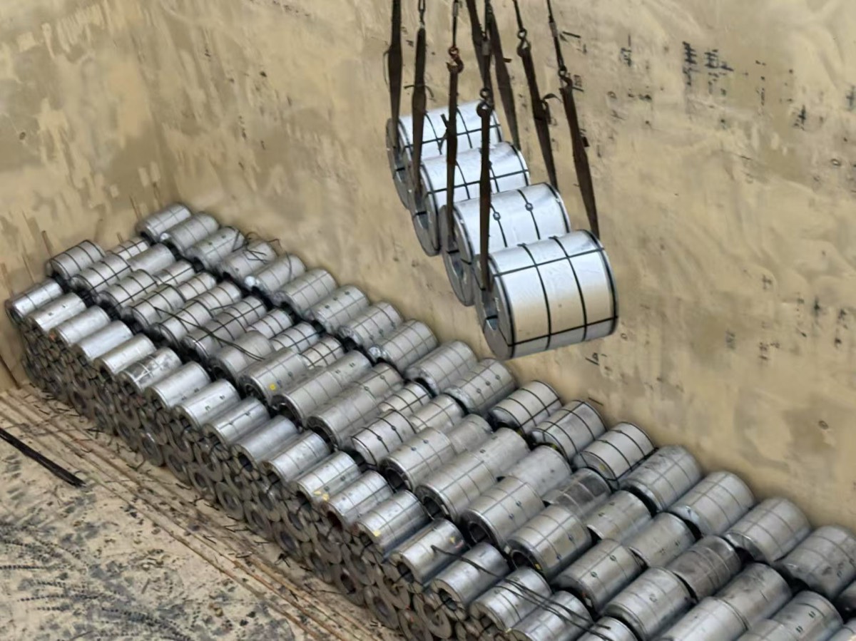 Coils being stowed in the hold